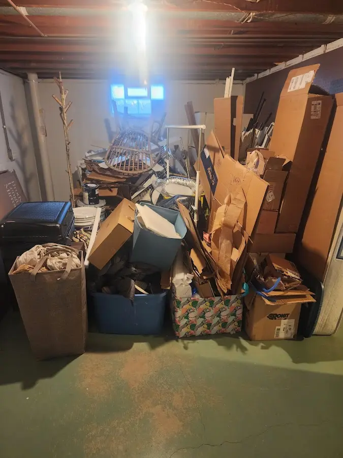 Roll-off dumpster container at job site for 4 Yard Dumpster Rental in Charlotte